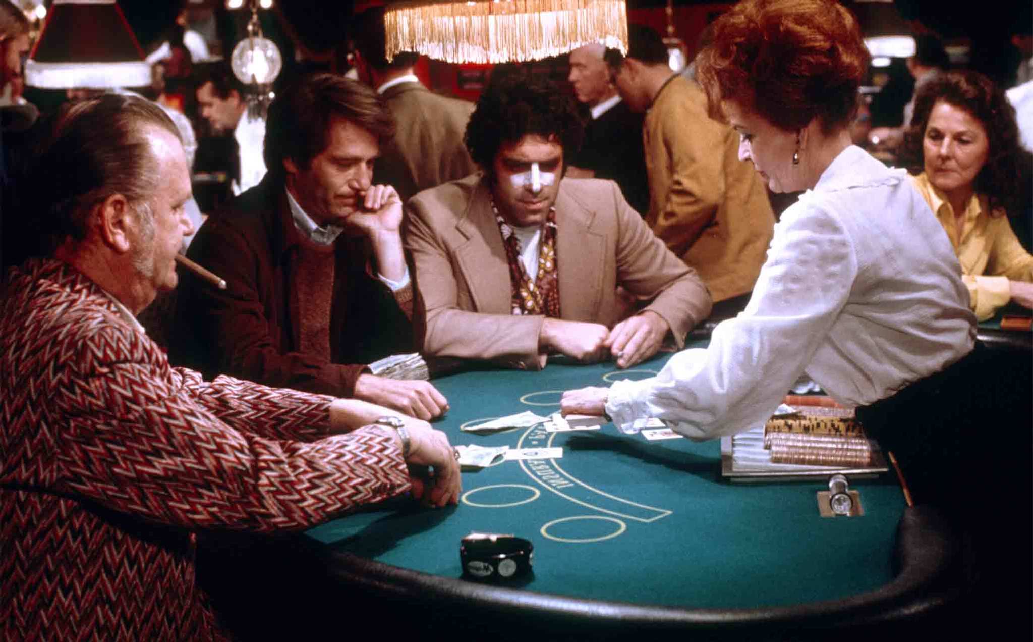 California Split (1974) Directed by Robert Altman Shown second from left: George Segal (as Bill Denny), Elliott Gould (as Charlie Waters)