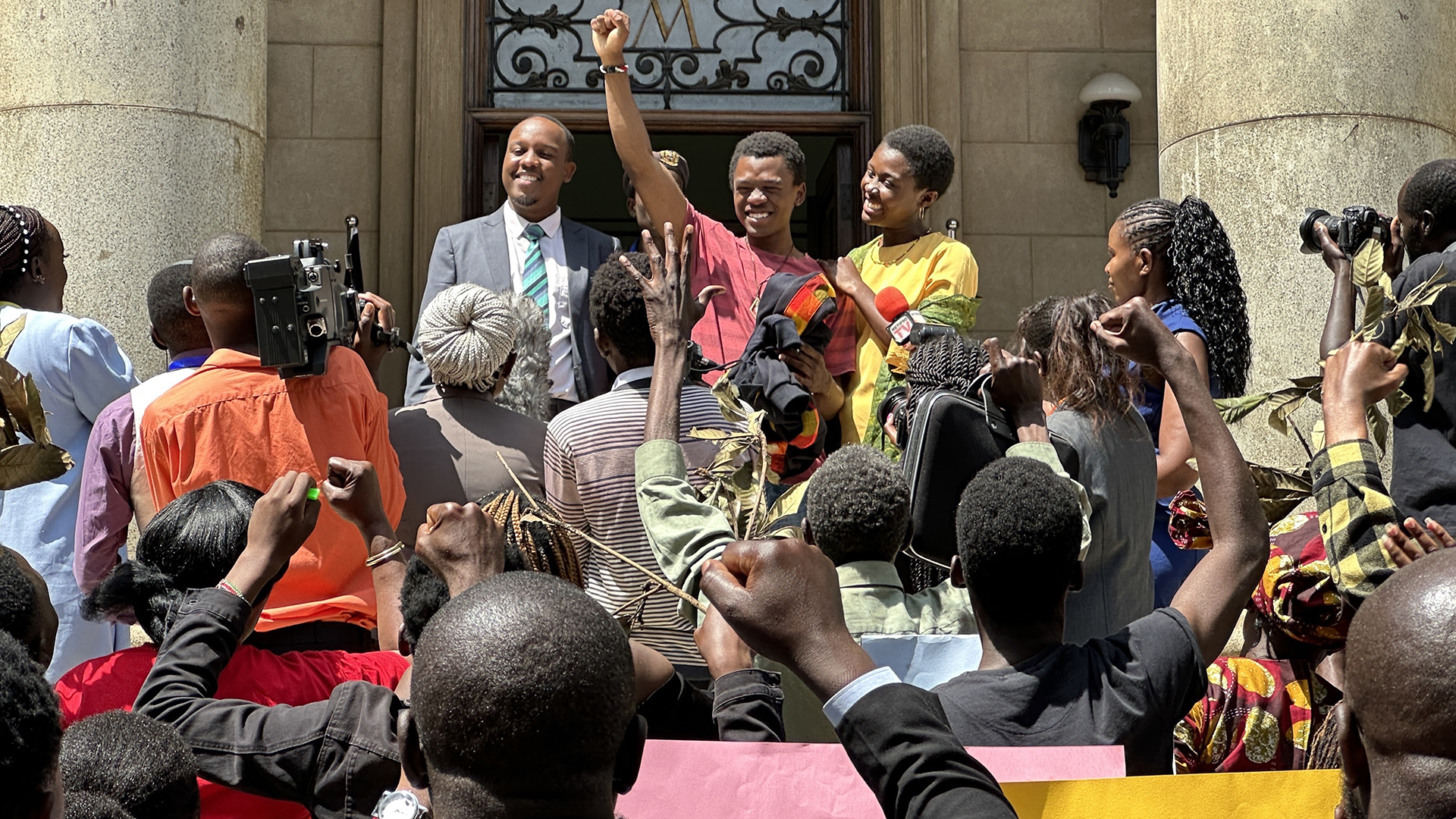 Thamela Mpumlwana as Kipkemboi with Elsie Abang and Abel Mutua