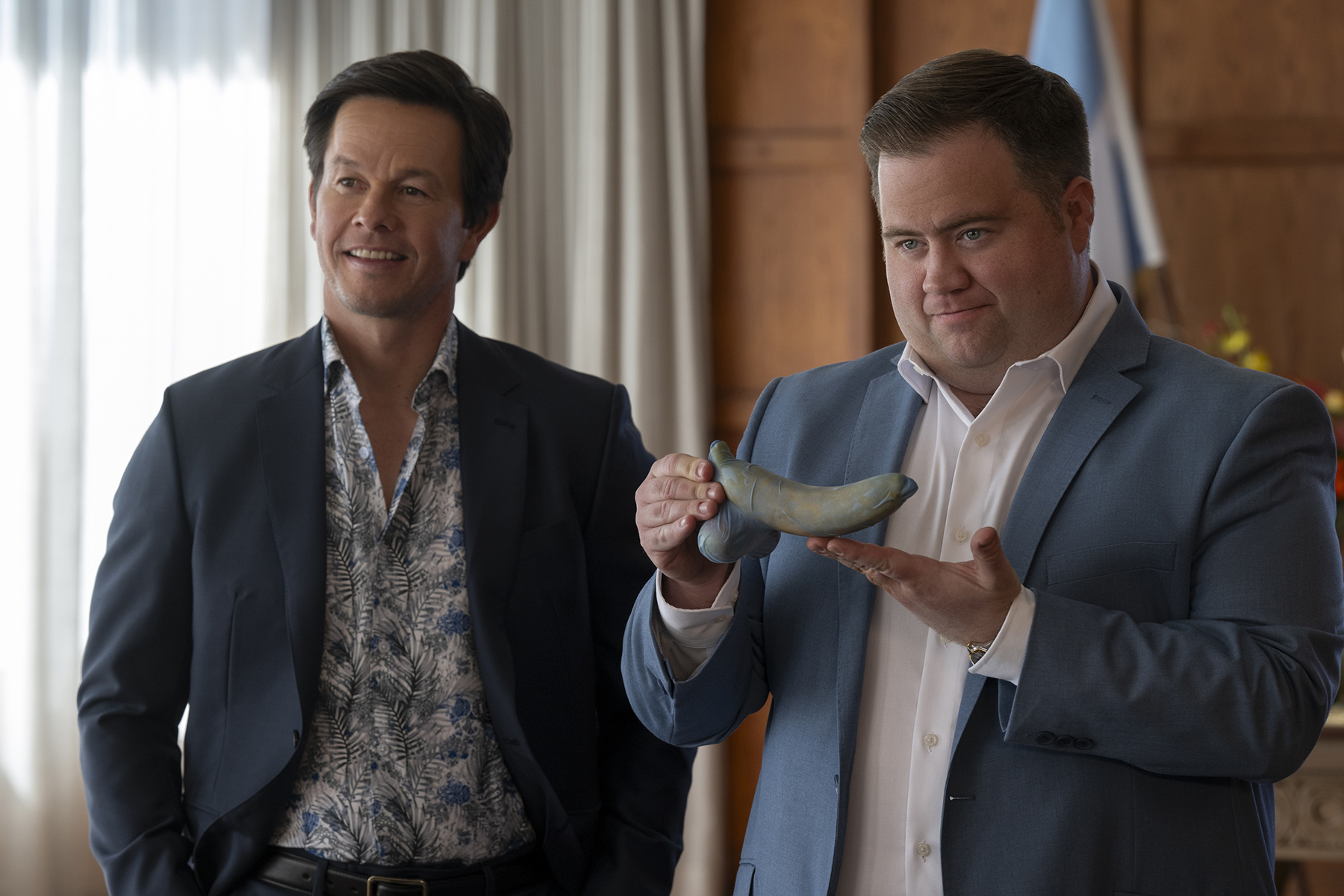 Brad (Mark Wahlberg) and Elijah (Paul Walter Hauser) in BALLS UP.  Photo Credit: Ben Rothstein Prime Video © Amazon Content Services LLC