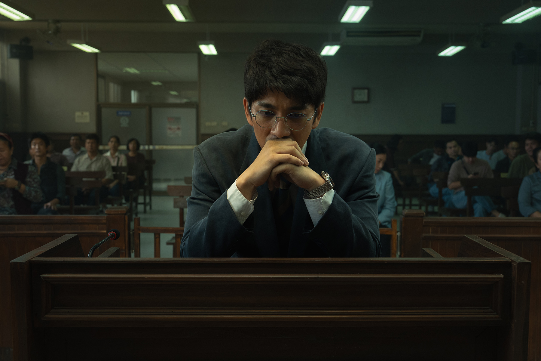 The Evil Lawyer. Nat Kitcharit (ณัฏฐ์ กิจจริต) as Mek Piriyawich (เมฆ พิริยาวิชญ์) in The Evil Lawyer Cr. Cai Lian Jie © 2026 Netflix