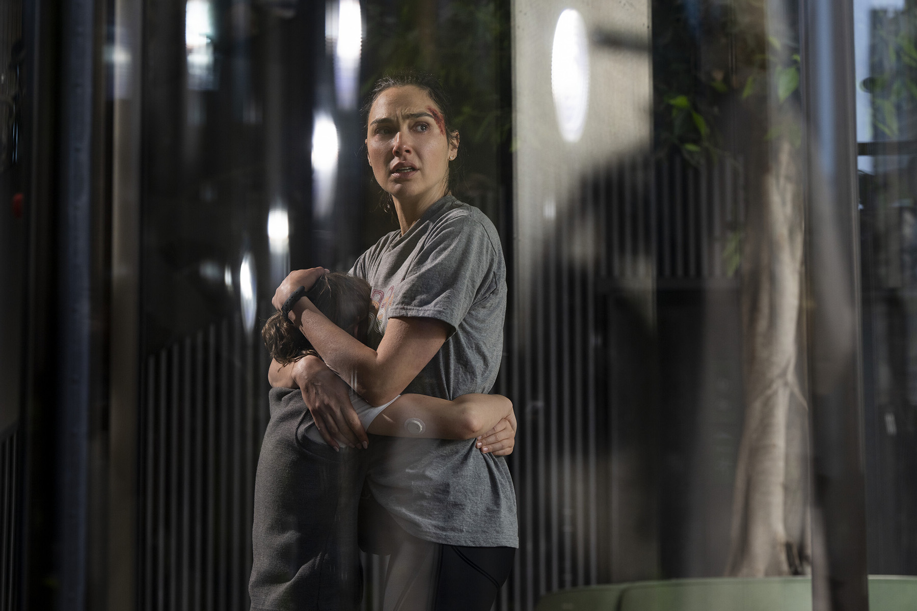 [L-R] Rory Wilmot as “Noah Marten” and Gal Gadot as "Maia Marten in the thriller suspense-action, THE RUNNER, from Amazon MGM Studios. Photo credit Amazon MGM
