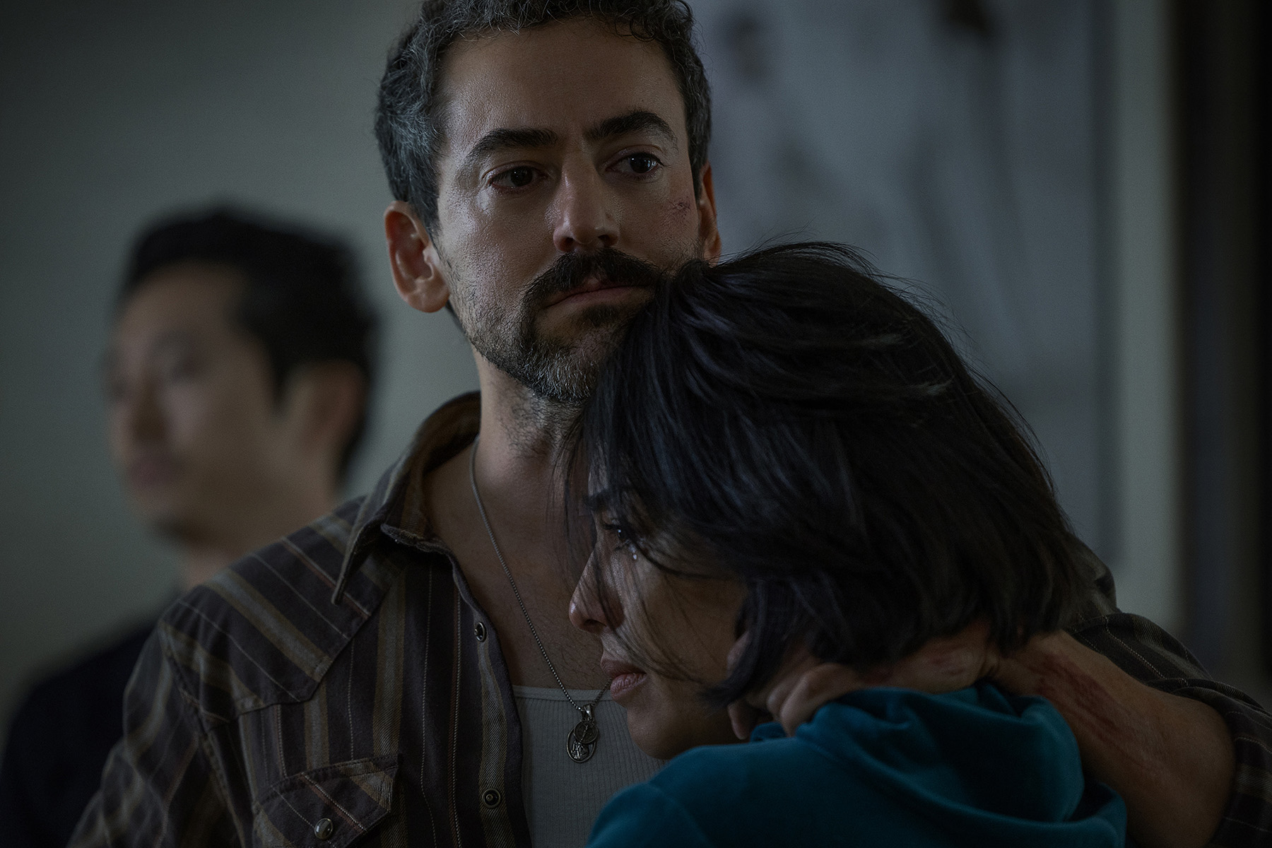 ANIMALS. (L to R) Steven Yeun as Sam, Luis Gerardo Méndez as Ramon and Adriana Paz as Cecilia in Animals. Cr. Warrick Page/Netflix © 2026.