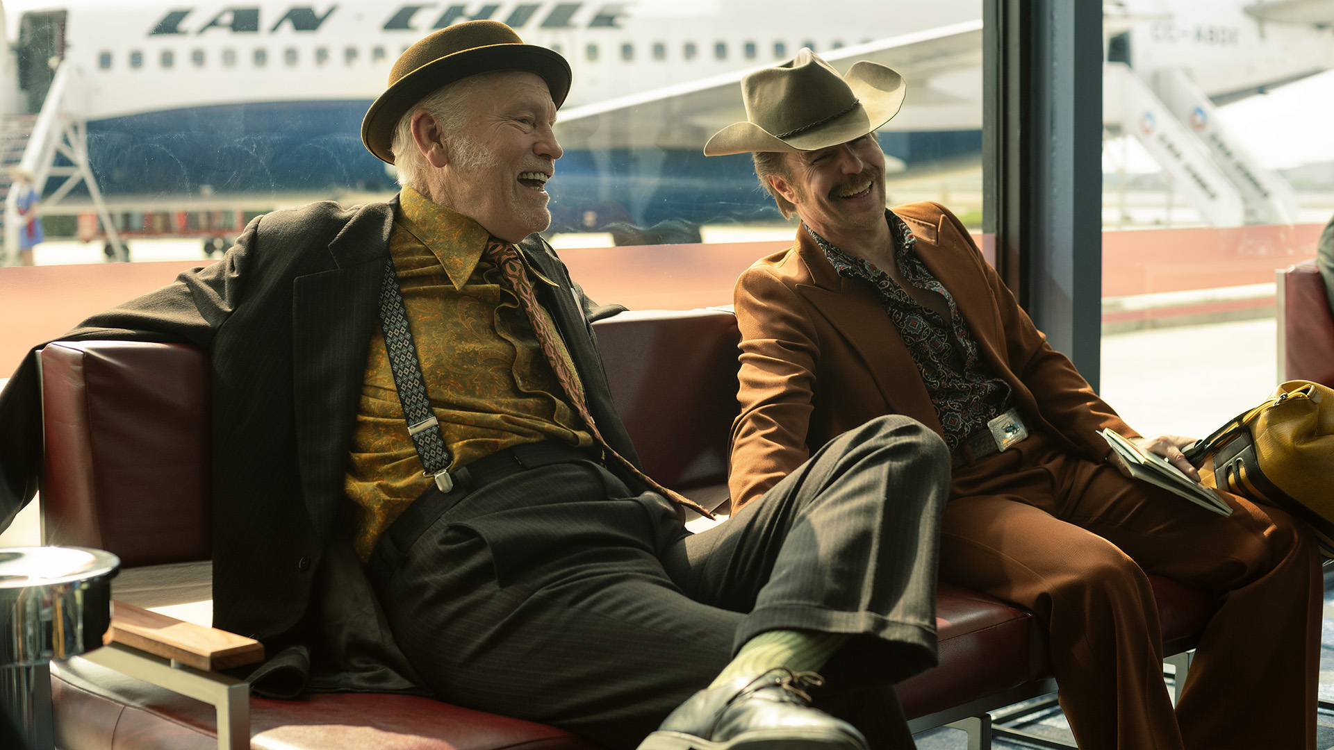 John Malkovich and Sam Rockwell in WILD HORSE NINE. Photo by Searchlight Pictures/Diego Araya Corvalán, Courtesy of Searchlight Pictures. © 2026 Searchlight Pictures. All Rights Reserved.